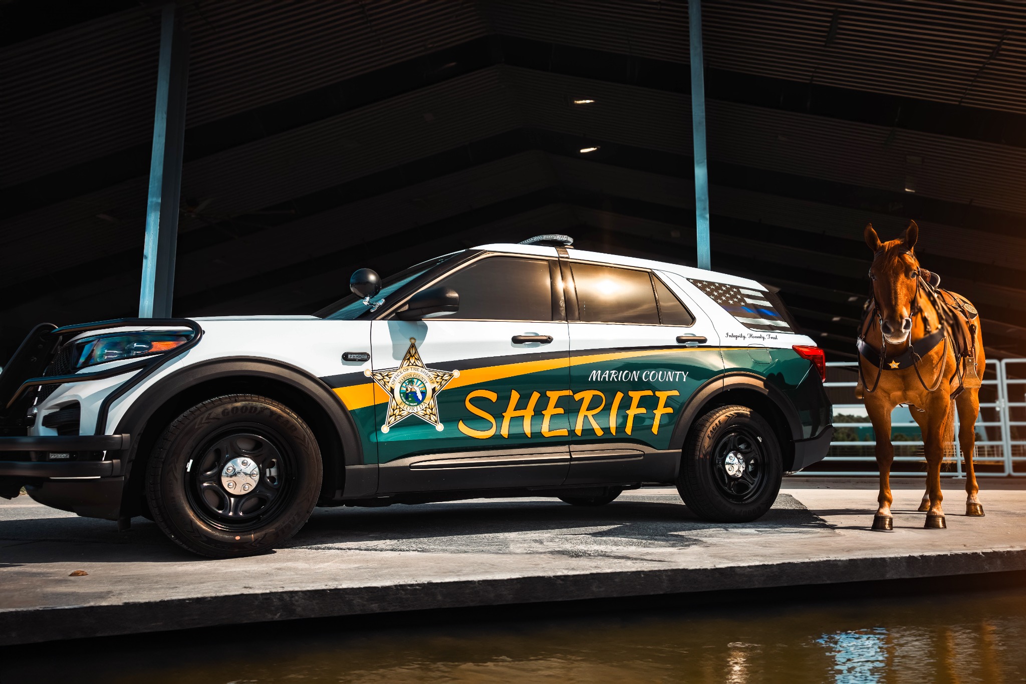 Marion County Sheriff patrol SUV with mounted unit horse